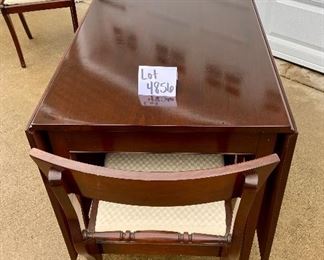 Lot 4856. $675.00  Morganton Drop Leaf Dining Table with three side chairs and one captain chair.  The drop leaf table has legs that swing out to support the drop leaf, very good condition. Needs only minor attention.   (Table: 73"L extended, 26" W  folded x 46" L) The cushions of the chairs may need to be re-upholstered. (Chairs: 33" H back, seat 18"W x 16" D.  Coordinating hutch and sideboard are available as well.	