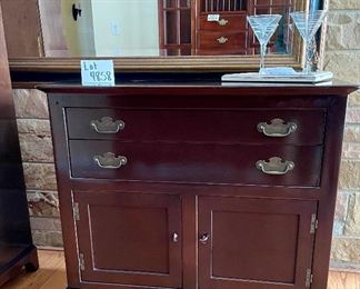 Lot 4858.  $375.00  Small Buffet/Sideboard by Morganton Furniture.  Storage behind doors and two drawers.  	37" W x 17" D x 34"H. Perfect Buffet or Bar.  Storage underneath and 2 Drawers. Pictured with Martini glasses