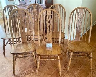 Lot 4861. $240.00  Set of 4 Amish-Made Oak Dining Chairs, superbly crafted.  There is no comparison! 	41" to the back, seat is 18"wide x 15"deep x 17.25" tall from floor. Solid Construction and we have a Matching Oak Pedestal Table as well. (2 were sold)