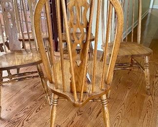 Lot 4861. $240.00  Set of 4 Amish-Made Oak Dining Chairs, superbly crafted.  There is no comparison! 	41" to the back, seat is 18"wide x 15"deep x 17.25" tall from floor. Solid Construction and we have a Matching Oak Pedestal Table as well. (2 were sold)