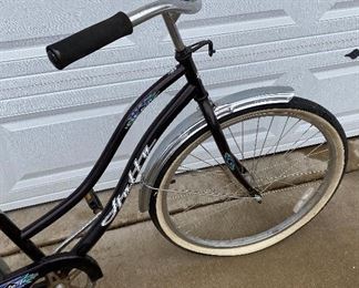 Lot 4876  $50.00  Vintage Black Santa Fe by Huffy Women's Cruiser  Bike  24"  with Eddie Bauer Seat and front/rear chrome fenders.  Tires need to be inflated.