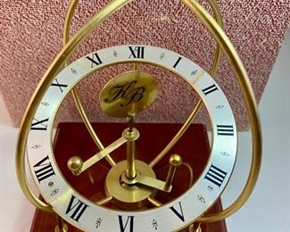 Lot 4900  $20.00  KB Space Desk Clock Made in West Germany with Mahogany Colored Base.  With original box.  