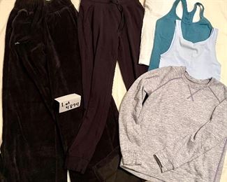 Lot 4894. $125.00  Six Activeware Garments - Lululemon Haul: Velour Wideleg Drawstring Pants (sz 2), oh so soft cotton joggers (size 4), 2 ribbed tanks with bralets, 1 ribbed tank no liner, and a gray rear gathered sweatshirt. (all shirts seem to be small or xsmall). All are in like new condition.  Consignor is/was a "Lululemon Ambassador," where the company would give her complimentary clothing for her promotion of their local store to her clients in her personal training and yoga studio.  Hence she removed tags before consigning garments. 
