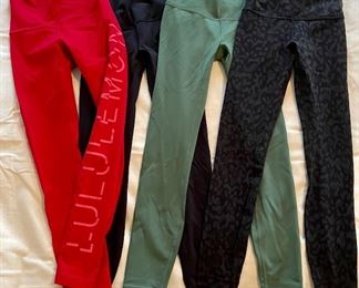 Lot 4890. $96.00  Lululemon: Lot of 4 pairs of Lululemon Leggings, all size small. Black, Sage Green, Cherry Red with Lululemon on leg, and Black and Gray Leopard print. 25" inseams. All in excellent condition (but no tags). Consignor is/was a Lululemon Ambassador and she removed all tags before consigning.  Most of the Lululemon clothing following has not been worn.  