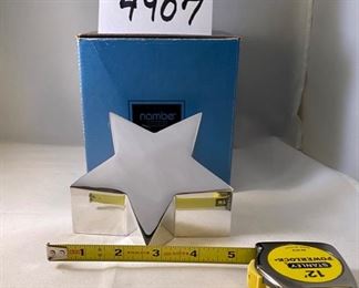 Lot 4907 $20.00 Ea.  Nambe' Star Paperweight.  Made in USA  3.5" H x 5" W.  Quantity 29.  We have MANY of this item.  Ask about our quantity discounts.
