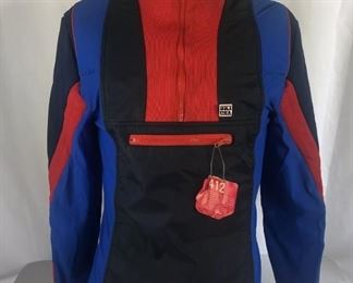 Lot 24
Vintage  Roffe Pull Over Jacket Skiwear Blue Red With Ski USA Pin And Ski Tag with original tag Zip Up woman’s large or men’s small /medium pretty much anyone could wear this Has a pocket zipper on the front and high turtle neck zip up collar . Noticed some stains on the shoulder area and on red collar. Little signs of wear on the sleeves and cuffs $12 really cool looking