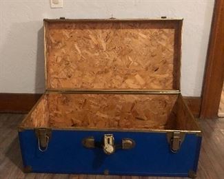 Lot 28 
Vintage blue steamer trunk 
Has some wear 
Couple scratches 
Has the name danny on it 
Pretty big and spacious can hold lots of storage $12