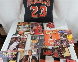 Lot 35 
Michael Jordan collection, hand made vintage jersey pillow, cards magazines have some wear very cool to collect $25 for the whole bundle