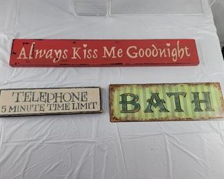 Lot 42 
Decor signs one metal they have some wear cute decor $4 for the whole bundle