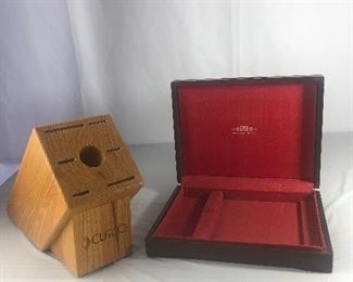 Lot 48
Cutco pair knife holder & wooden utensil holder box. 
Has some wear 
Box has a crack $13