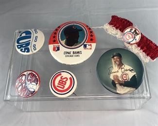 Lot 50 
Vintage Chicago Cubs pin back pins Ernie Banks & band has some wear $15 for the whole bundle