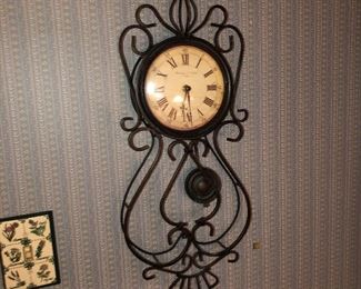 Sterling metal wall clock