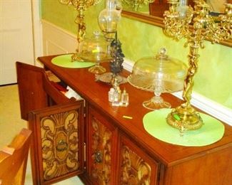 Mid Century oak sideboard with tall brass candelabra