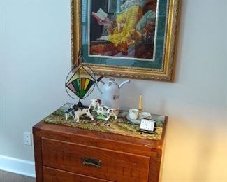 Chest of drawers, needlepoint picture, enamel petroleum can, made in Japan spaniels, traveler alarm clock