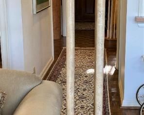 One of two matching floor lamps