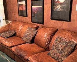 Two 2-seat leather sofas