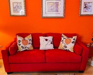 Bloomingdales Red Sofa seats 3 comfortably; Pier 1 Pillows