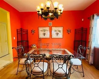 6-seater Fortunoff Dining Table with Glass Top and Wrought Iron Chairs; Framed Art, Side Steel Cabinet, Star Sconces, Chandelier Imported from Malta, Wall Art,