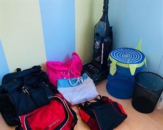 Duffle Bags, Tote Bags, Hoover WindTunnel Self Propelled Vacuum Cleaner, Steel Trash Bin, Kids Hamper (in Bedroom 2)