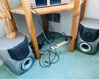 Speakers with Aiwa Radio, Wooden Person Figure, Surge Protector