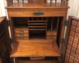 Walnut Wooten Desk with Swing Out Multi drawer files, Drop front writing Desk, Original Cast Iron Plaque Dated 1874