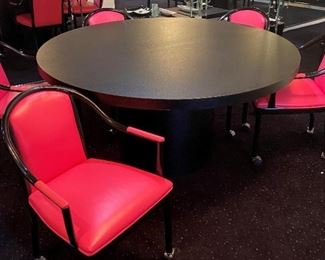 $375       Round table 60" diameter, x 24" h, with 7 Pinkish/Red Vinyl Chairs