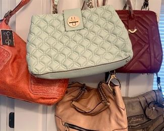 A nice selection of ladies handbags; mint green Kate Spade