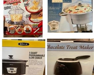 A large selection of crock pots, pressure cookers, and other kitchen appliances.