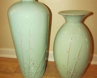 •	Item 22: Set of (2) celadon glazed and bamboo pattern ceramic vases. Each is approximately 7” wide. Also 19.5” tall and shorter is 15.5” tall. PRICE FOR TWO: $40.00