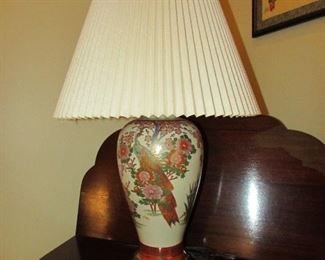 •	Item 42: Asian-style ceramic lamp with shade. 18.5” wide at shade x 30” tall to top of finial. PRICE: $50.00