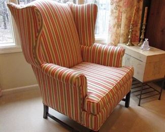 •	Item 45: Striped custom upholstered wing chair with scattered small areas of staining to fabric. Approximately 33” wide x 31” deep x 42.5” tall. PRICE: $125.00