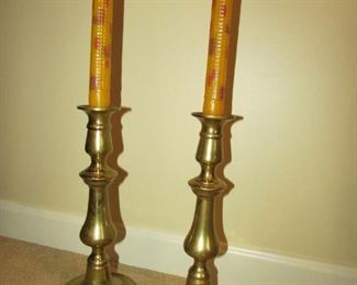 •	Item 46: PAIR of heavy brass candle sticks stamped “England” on bottom. 10” tall x 4” wide. PRICE FOR PAIR: $30.00