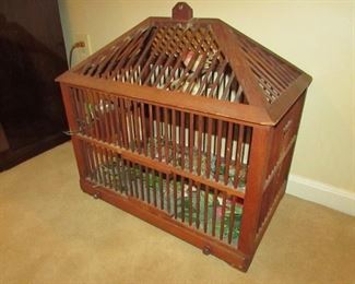•	Item 51: Vintage wooden birdcage with dovetailed construction and metal tray. 19.5”wide x 13”deep x approx. 18” tall. PRICE: $75.00
