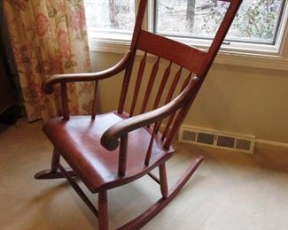 •	Item 52: Antique plank bottom rocker with traces of original redwash finish. Loose joints, as expected with age. 21”wide x 31”deep at rocker x 41.5” tall. PRICE: $95.00