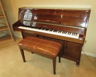 •	Item 57: Baldwin E150 piano with bench. Serial number 05895. Must be removed by professional piano moving company at purchaser’s expense. 57”wide x 20”deep x 40.5”tall. PRICE: $250.00