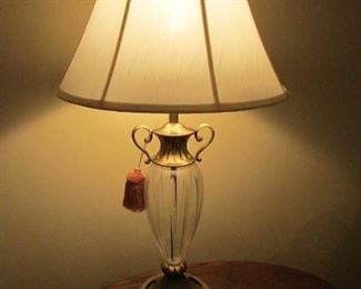 •	Item 62: Crystal and brass lamp. 29.5” tall x 17” wide. PRICE: $40.00
