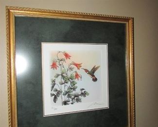•	Item 70: Signed and framed hummingbird print. (Number 50 of 800). Approximately 14.25” square x ¾” thick. PRICE: $30.00