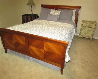 •	Item 72: Queen sleigh bed. (mattress, box spring, and bedding included). 67” wide x 86” long x 46.5” tall. PRICE: $250.00