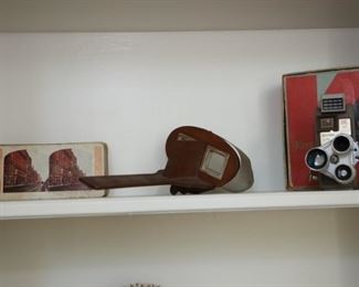 Antique stereoscopic viewer with cards and vintage Kodak video camera