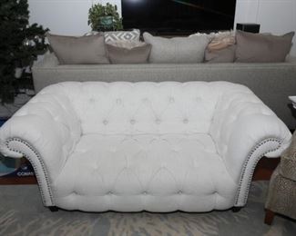 White tufted roll arm sofa loveseat