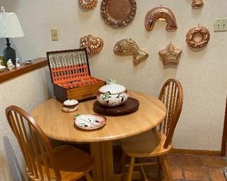 SMALL DINING TABLE WITH 2 CHAIRS/BOXED SET OF S/P FLATWARE/LARGE COLLECTION OF COPPER MOLDS / DEFOREST POTTERY 