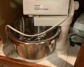 $60 CONVERTIBLE KRUPS MIXER.  DETACHABLE HAND MIXER ATTACHES TO BASE FOR STAND MIXER USE WITH 2 SETS OF BEATERS
