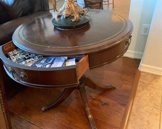 $325 LEATHER TOPPED PEDESTAL TABLE