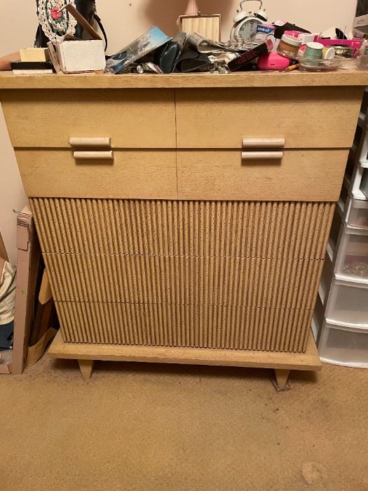This dresser is just one of the many mid-century blonde pieces -- as the retro trend continues to be popular, this sale is full of many examples like this one!