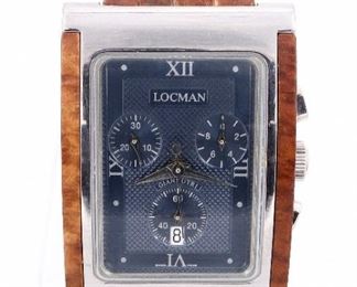 A Locman Giannutri "Milano" model gentleman's chronograph wristwatch. Quartz movement with Blue texture dial, three subsidiary dials and lower date aperture. Stainless case with Briar wood inserts, leather band with deployment buckle. Minor wear, needs battery. ESTIMATE $200-300