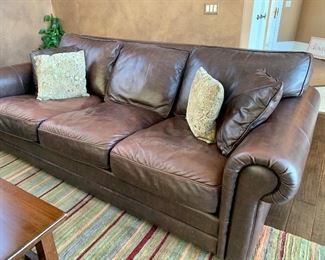 Each sofa measures 7’7” wide