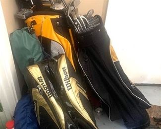 Assortment of golf clubs