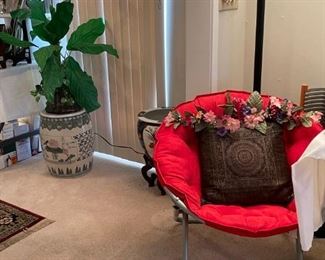 ROUND RED CHAIR WITH IRON BASE THERE ARE 2 OF THESE CHAIRS