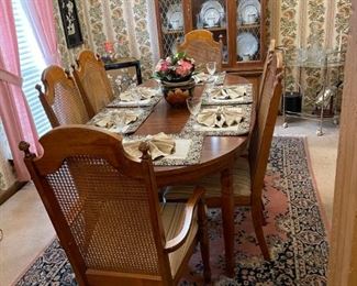 DINING TABLE AND CHAIRS AND PINK RUG