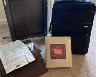 Portable Electric Heater Full Size Air Mattress Set of Sheets and Carry On Suitcase